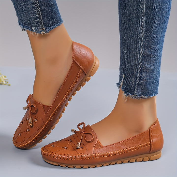 Ladies Casual Flat Penny-Loafer | All-Season, Synthetic faux leather with Bow Embellishment, Flannel Inner, TPR Sole, Non-Woven Insole