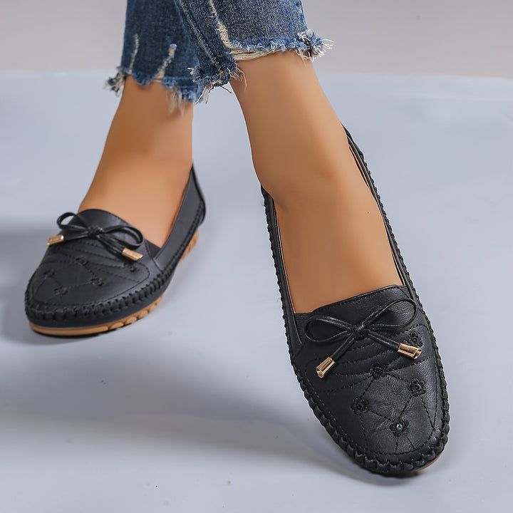 Ladies Casual Flat Penny-Loafer | All-Season, Synthetic faux leather with Bow Embellishment, Flannel Inner, TPR Sole, Non-Woven Insole